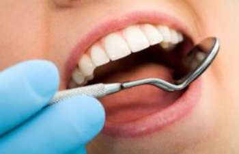 A woman during a dental checkup.